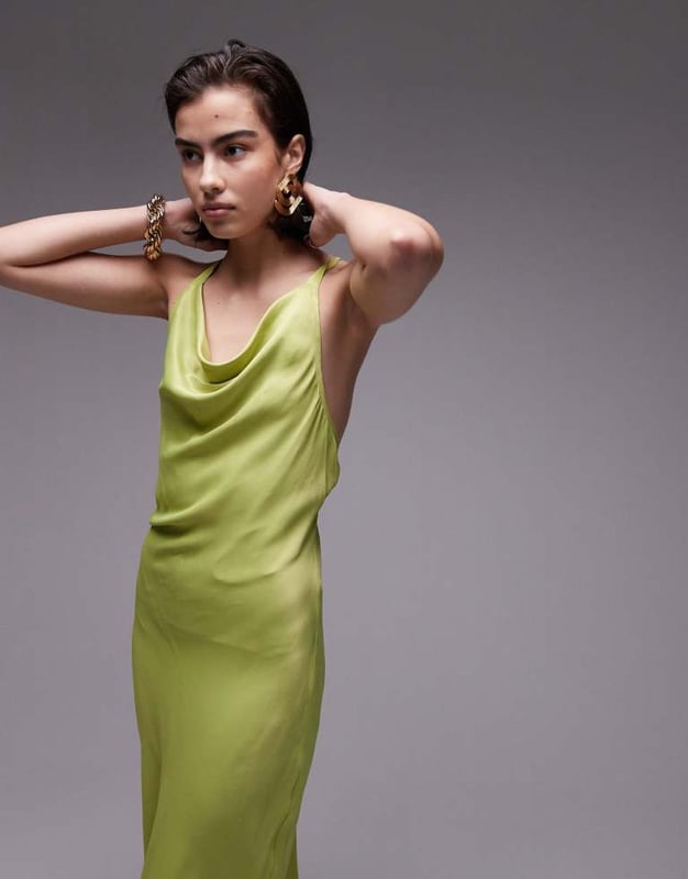 Dresses by Topshop This is Topshop Cowl neck Cross-back straps Low back Regular fitSold By: Asos