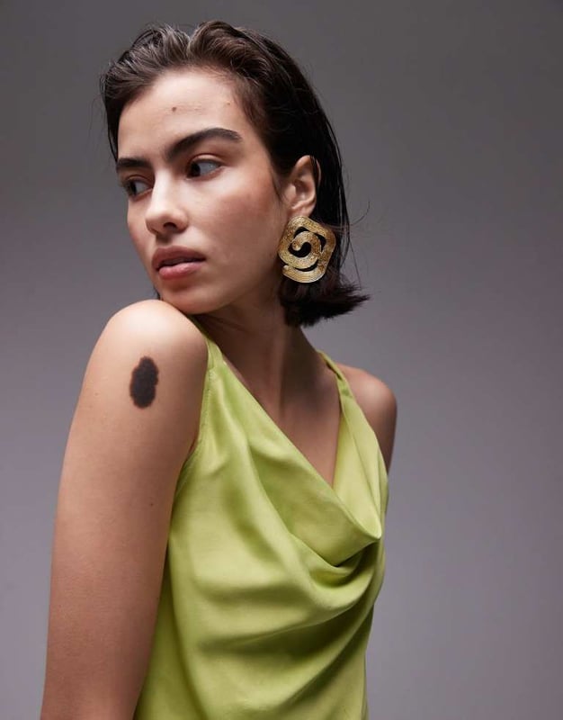 Dresses by Topshop This is Topshop Cowl neck Cross-back straps Low back Regular fitSold By: Asos