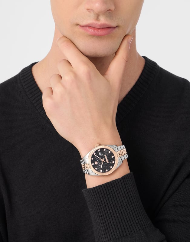 This Philipp Plein Date Superlative Analogue Watch for Men is the perfect timepiece to wear or to gift. It's Multicolour 41 mm Round case combined with the comfortable Multicolour Stainless steel watch band will ensure you enjoy this stunning timepiece without any compromise. Operated by a high quality Quartz movement and water resistant to 5 bars, your watch will keep ticking. Philipp Plein slays the SS25 season with the iconic Date Superlative, now transformed into a statement-making pair watch. This Analogue watch has a calendar function: Date as well as Luminous Hands High quality 21 cm length and 20 mm width Multicolour Stainless steel strap with a Deployment clasp Case diameter: 41 mm,case thickness: 9.7 mm, case colour: Multicolour and dial colour: Brown