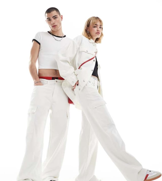 Calvin Klein Jeans co-ord 90s loose cargo jeans in white wash - ASOS Exclusive Jeans by Calvin Klein Jeans Jacket sold separately Relaxed fit Belt loops Functional pockets Branded patch to reverse Unisex styleSold By: Asos