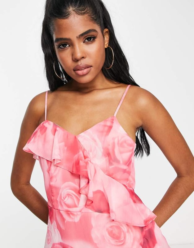 Miss Selfridge chiffon asymmetrical hem mini dress in oversized rose-Pink Dresses by Miss Selfridge A round of applause for the dress Floral design V-neck Adjustable straps Asymmetric hem Regular fitSold By: Asos