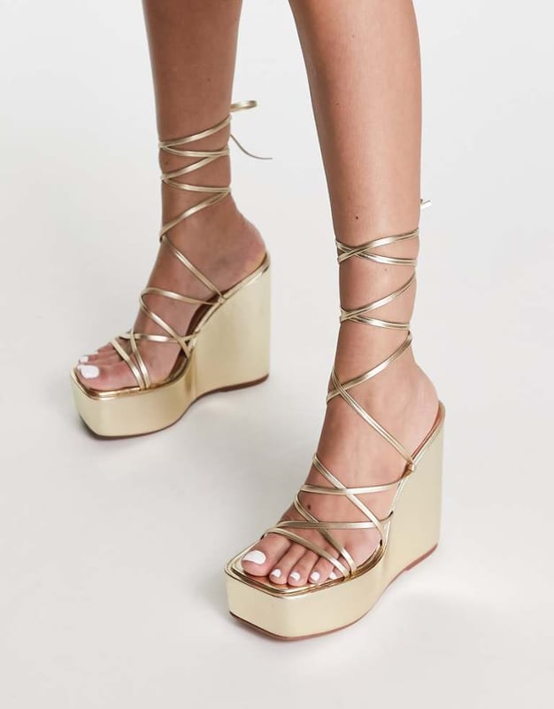 Shoes by ASOS DESIGN Dress from the feet up Tie-leg fastening Open toe Platform sole High wedge heelSold By: Asos