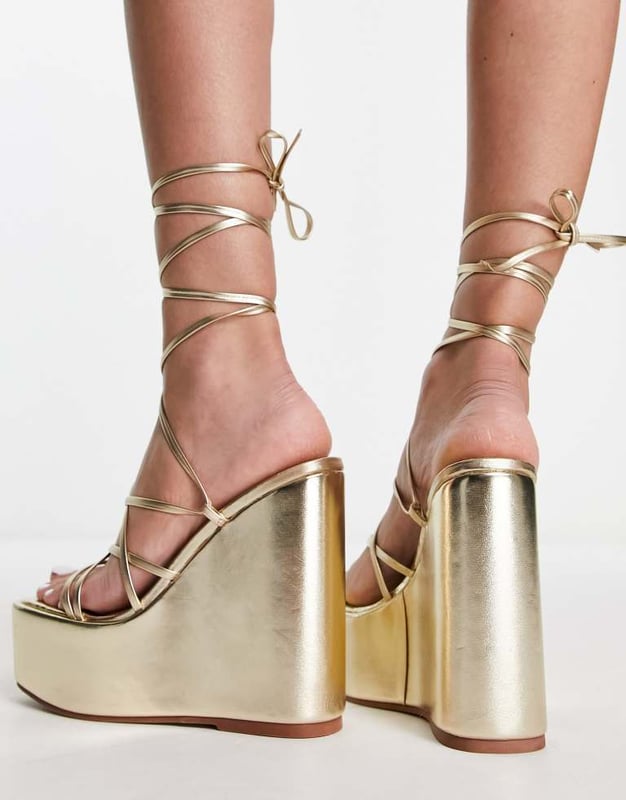 Shoes by ASOS DESIGN Dress from the feet up Tie-leg fastening Open toe Platform sole High wedge heelSold By: Asos
