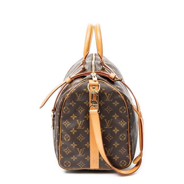 Louis Vuitton Bags Keepall Bandouliere 45 Travel Bag in Brown Monogram Canvas and Golden Brass hardware. The product is in Excellent Condition (A).
  Dimensions: 45x24x20 cm 
  Accessories Included: Strap
  
  BrandCo Paris finds rare and top condition items at great deals, they are worth your patience!
  Shop with confidence - All BrandCo Paris items are carefully selected and authenticated by our team of experts.
  All the items come with an authenticity certificate and packaging delivered by BrandCo Paris.
  Item Condition Grading Table
    N  (Like New)
    AA (Perfect Condition)
    A  (Excellent Condition)
    AB (Very Good Condition)
    B  (Good/Fair)