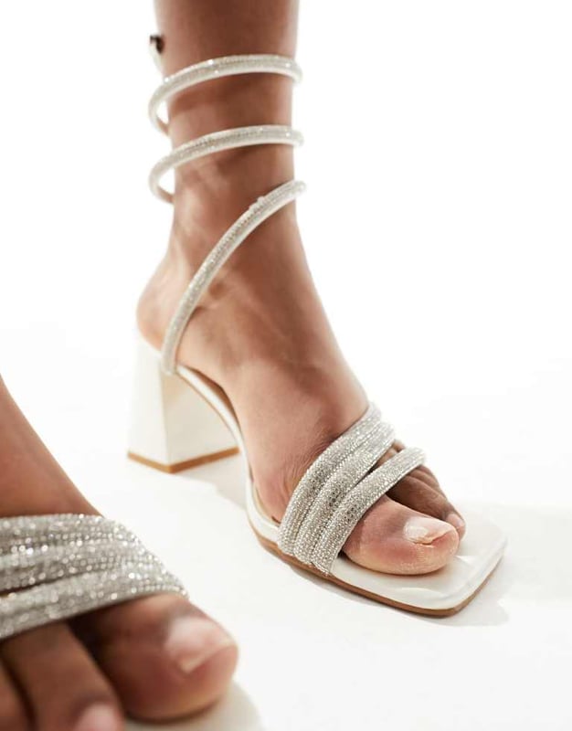 Shoes by SIMMI Shoes Dancefloor approved Spiral strap Diamante embellishment Open toe Mid block heelSold By: Asos