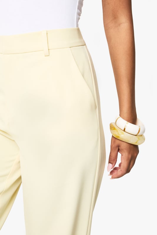 Slim-fit design with a flattering straight leg silhouette
        Sleek belt loops with a thin belt detail for a polished finish
        High-rise waistband for a figure-enhancing fit
        Smooth fabric with slight stretch for all-day comfort
        Clean-cut trouser styling perfect for versatile day-to-night wear
    
    These sophisticated straight-leg trousers from boohoo combine contemporary style with effortless versatility. The slim fit contours your silhouette whilst the straight leg offers a timeless appeal that works brilliantly for evening occasions. Style them as shown with a halterneck bodysuit and strappy heels for a chic night out ensemble, or pair with a cropped blazer and statement jewellery to command attention at after-work drinks. The clean lines and minimalist design make these trousers an essential foundation piece for your going-out wardrobe. Their subtle elegance allows for endless styling possibilities-dress them up with a sequined top for club nights or keep it understated with a silky camisole for cocktails with friends. These trousers transition seamlessly from early evening gatherings to late-night dancing.