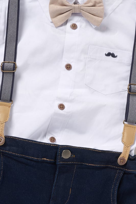 Dress your little one to impress with this delightful set from Little Gent. Featuring a shirt, bowtie, and shorts with attached braces. Perfect for special occasions or stylish outings, your little one will look effortlessly dapper and be ready to steal the spotlight!