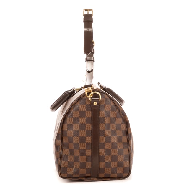 Louis Vuitton Tassen Speedy Bandouliere 35 Handtas in de Bruin Kalfsleer in de Gouden Messing  hardware. Het product is in In Perfecte Staat (AA).
  Afmetingen: 35x23x18 cm 
  Inclusief accessoires: Strap; Cadenas; Keys; Dustbag
      
  BrandCo Paris vindt zeldzame artikelen in de beste staat voor ongelooflijke prijzen. Het is de moeite waard om geduldig te zijn! Koop met vertrouwen: alle artikelen van BrandCo Paris worden zorgvuldig geselecteerd en geverifieerd door ons team van experts.

  Alle artikelen worden geleverd met een certificaat van echtheid en verpakt door BrandCo Paris.

  Classificatietabel voor de conditie van het artikel:

  N (als nieuw)
  AA (perfecte staat)
  A (uitstekende staat)
  AB (zeer goede staat)
  B (goede/redelijke staat)