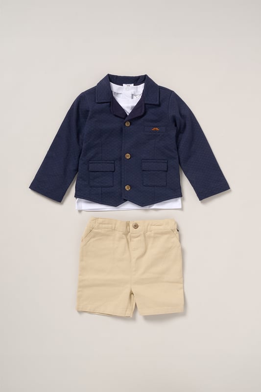 Dress your little one in style with this smart yet comfortable set from Little Gent! Featuring a button-up suit jacket, T-shirt, and matching shorts, this outfit is perfect for special occasions or casual outings. It ensures your little one looks sharp and feels relaxed all day long!