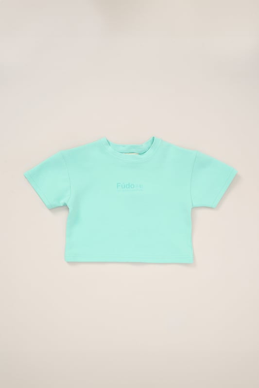 Keep your little one on trend this season with this 3-piece outfit set from Fudo. The set includes a heavyweight oversized T-shirt with a tonal chest logo, matching shorts with two large side pockets and a drawstring waist, plus stylish sunglasses. A comfy, trendy set that blends fashion and function for your little one’s wardrobe.