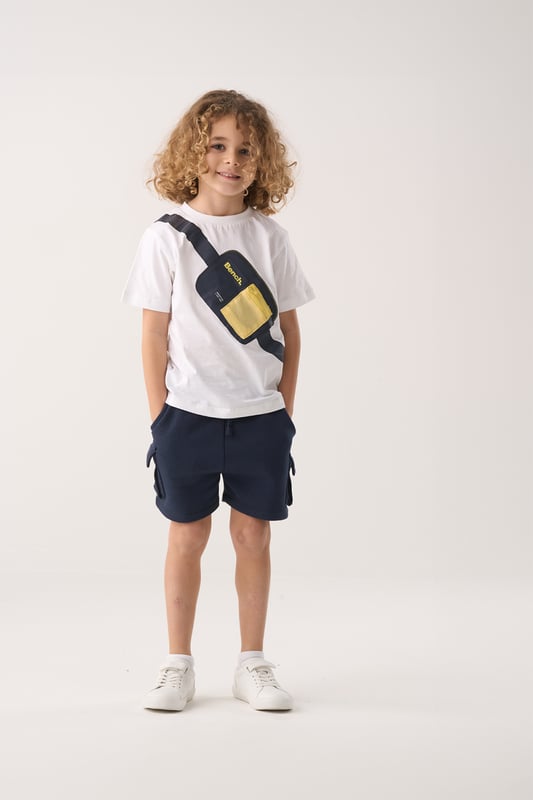 This Bench 2-piece set includes a breathable cotton t-shirt and comfy brushed sweat shorts – perfect for everyday adventures. The t-shirt features a fun printed bag graphic across the chest, complete with a zip detail for added style. The shorts have a soft elasticated waistband with a cotton drawcord for an easy, adjustable fit. A go-to outfit that blends comfort and playful design for active days.
