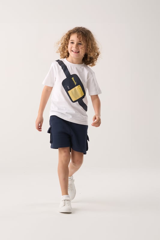 This Bench 2-piece set includes a breathable cotton t-shirt and comfy brushed sweat shorts – perfect for everyday adventures. The t-shirt features a fun printed bag graphic across the chest, complete with a zip detail for added style. The shorts have a soft elasticated waistband with a cotton drawcord for an easy, adjustable fit. A go-to outfit that blends comfort and playful design for active days.