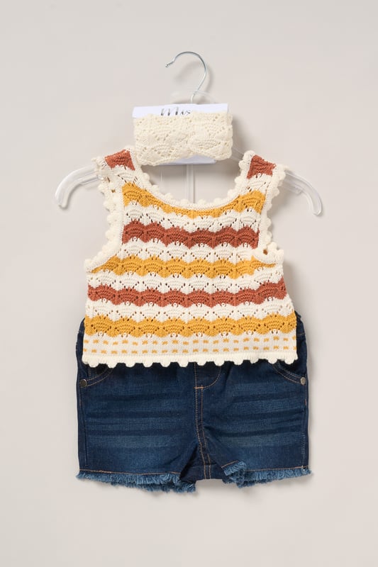 This adorable set by Miss includes a true knit top, denim shorts, and a matching headband. Perfect for warm days, it combines style and practicality, making it an ideal choice for playdates, outings, or casual summer looks.