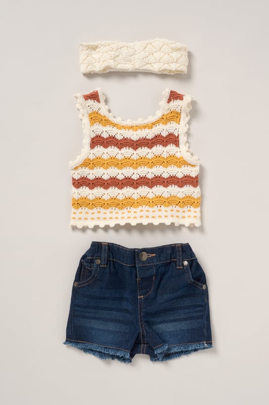 This adorable set by Miss includes a true knit top, denim shorts, and a matching headband. Perfect for warm days, it combines style and practicality, making it an ideal choice for playdates, outings, or casual summer looks.