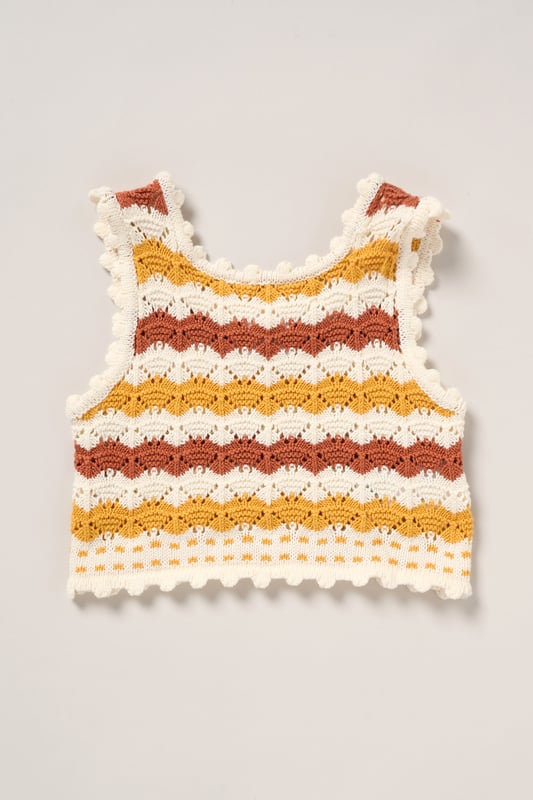 This adorable set by Miss includes a true knit top, denim shorts, and a matching headband. Perfect for warm days, it combines style and practicality, making it an ideal choice for playdates, outings, or casual summer looks.
