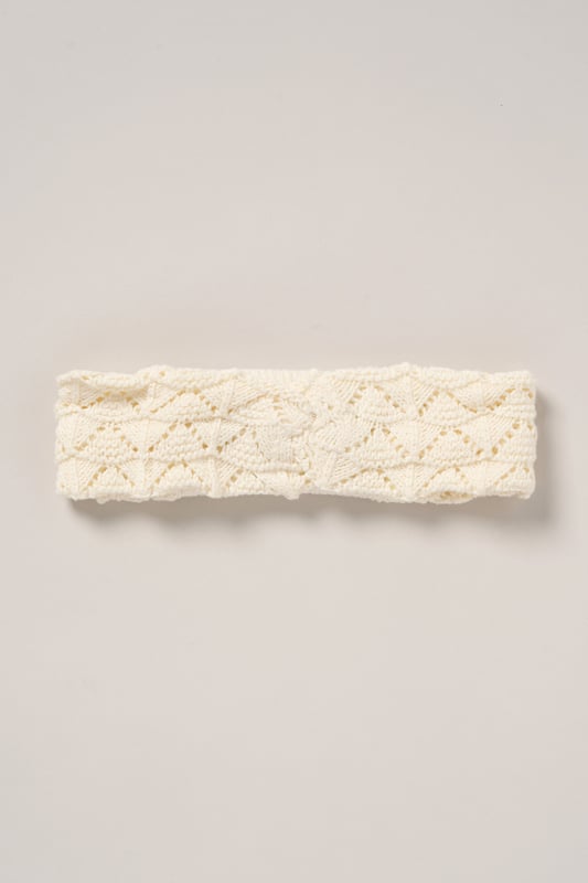 This adorable set by Miss includes a true knit top, denim shorts, and a matching headband. Perfect for warm days, it combines style and practicality, making it an ideal choice for playdates, outings, or casual summer looks.