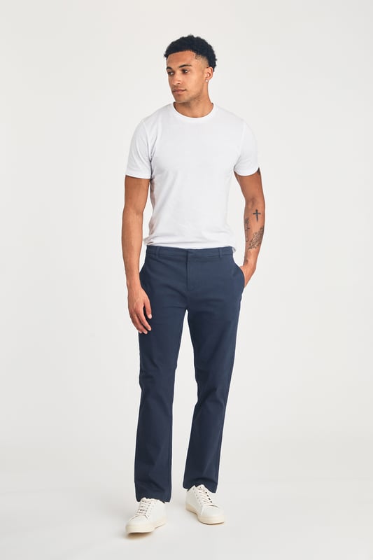 The Nines Cotton Trousers offer a classic, straight-leg fit with belt loops for a tailored look. Designed with side and back pockets for added convenience, these versatile trousers provide both style and practicality, making them a perfect addition to any wardrobe. Ideal for both casual and smart-casual wear.
