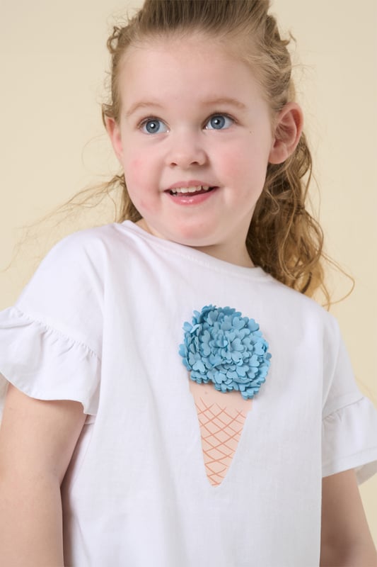 This cute set by Miss features a printed T-shirt with playful ruffle sleeves and a matching floaty skirt. Designed for twirling, exploring, and everything in between, it’s the perfect outfit for carefree days and fun-filled adventures.