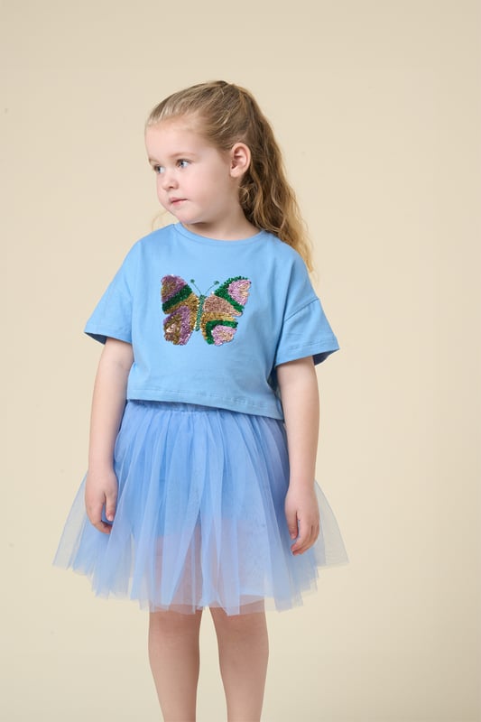 This cute set by Miss features a cropped printed T-shirt and a matching floaty skirt. Designed for twirling, exploring, and everything in between, it’s the perfect outfit for carefree days and fun-filled adventures.