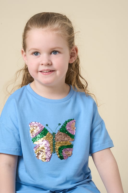 This cute set by Miss features a cropped printed T-shirt and a matching floaty skirt. Designed for twirling, exploring, and everything in between, it’s the perfect outfit for carefree days and fun-filled adventures.