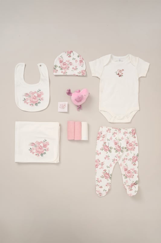 Celebrate the arrival of their little one with the 10-Piece Gift Set from Rock A Bye Baby Boutique. This adorable bundle includes a  printed bodysuit, footed trousers, bib, hat, washcloths and a cosy blanket. Complete with a plush toy for cuddly companionship and a gift card for a personal touch. Made from 100% cotton and packaged elegantly in a mesh bag.