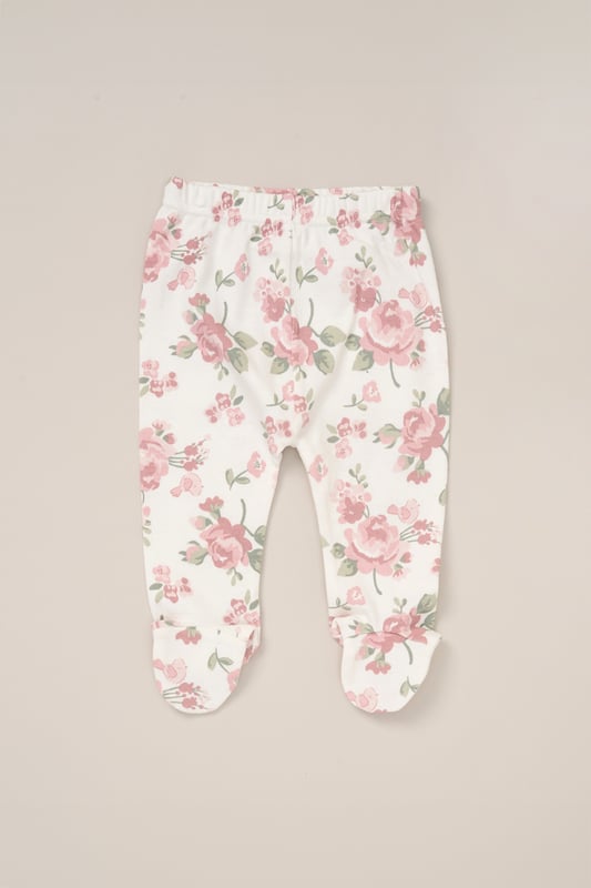 Celebrate the arrival of their little one with the 10-Piece Gift Set from Rock A Bye Baby Boutique. This adorable bundle includes a  printed bodysuit, footed trousers, bib, hat, washcloths and a cosy blanket. Complete with a plush toy for cuddly companionship and a gift card for a personal touch. Made from 100% cotton and packaged elegantly in a mesh bag.