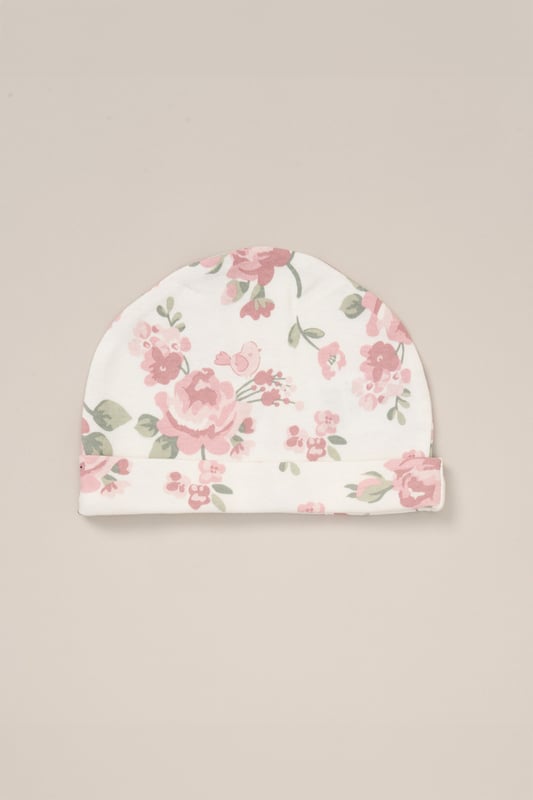 Celebrate the arrival of their little one with the 10-Piece Gift Set from Rock A Bye Baby Boutique. This adorable bundle includes a  printed bodysuit, footed trousers, bib, hat, washcloths and a cosy blanket. Complete with a plush toy for cuddly companionship and a gift card for a personal touch. Made from 100% cotton and packaged elegantly in a mesh bag.