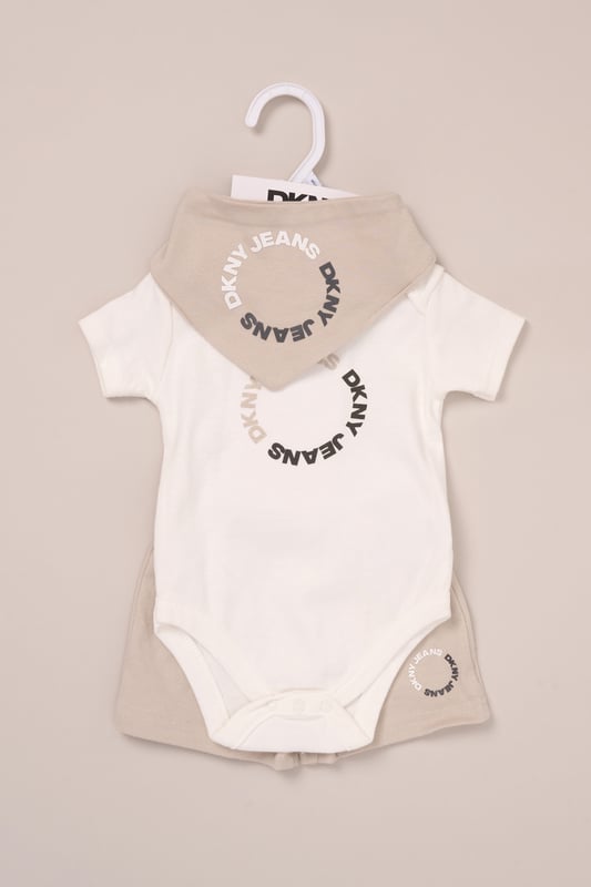 Designed for sunny days and busy babies, this 3-piece set from DKNY includes a cotton bodysuit, comfy shorts and a coordinating bib. A great go-to for playdates and mealtimes, it offers soft comfort and cute style in one. 100% cotton.