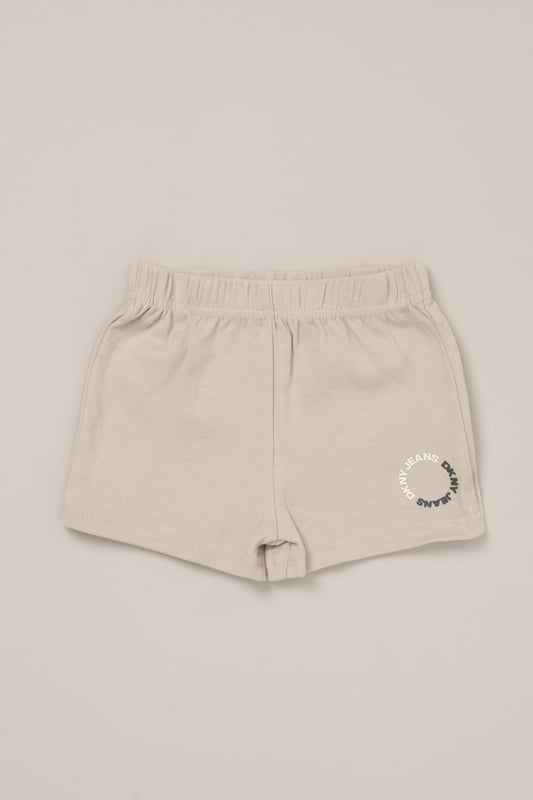 Designed for sunny days and busy babies, this 3-piece set from DKNY includes a cotton bodysuit, comfy shorts and a coordinating bib. A great go-to for playdates and mealtimes, it offers soft comfort and cute style in one. 100% cotton.