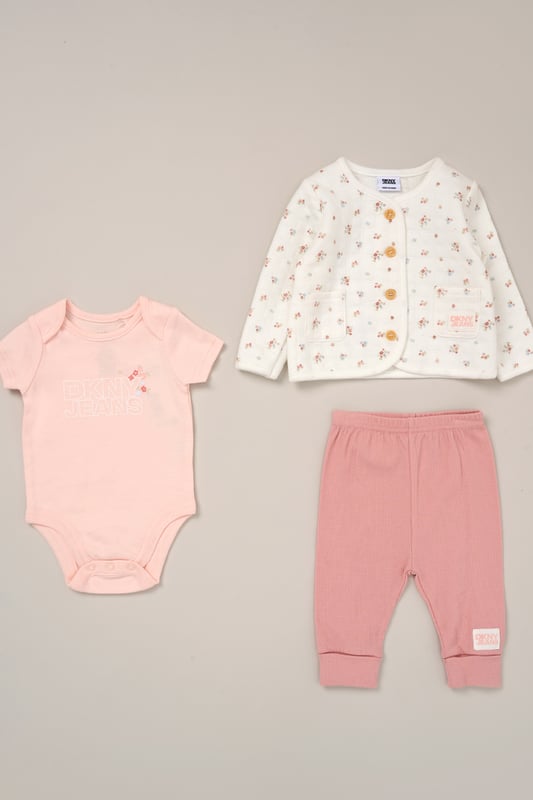 This soft and breathable 3-piece set from DKNY includes comfy cotton blend trousers, a short-sleeve bodysuit, and a coordinating cardigan - perfect for layering through Spring and Summer. Whether you're heading out or staying in, it’s a versatile everyday outfit for little ones.