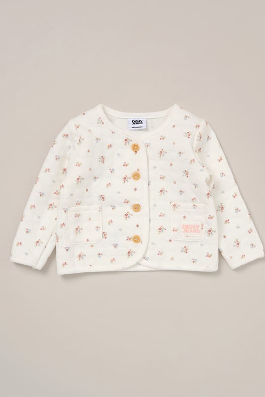 This soft and breathable 3-piece set from DKNY includes comfy cotton blend trousers, a short-sleeve bodysuit, and a coordinating cardigan - perfect for layering through Spring and Summer. Whether you're heading out or staying in, it’s a versatile everyday outfit for little ones.