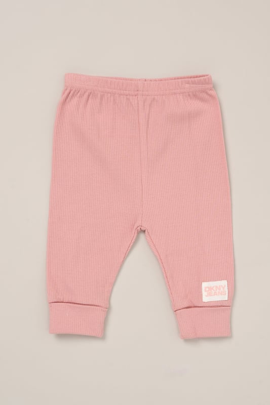 This soft and breathable 3-piece set from DKNY includes comfy cotton blend trousers, a short-sleeve bodysuit, and a coordinating cardigan - perfect for layering through Spring and Summer. Whether you're heading out or staying in, it’s a versatile everyday outfit for little ones.