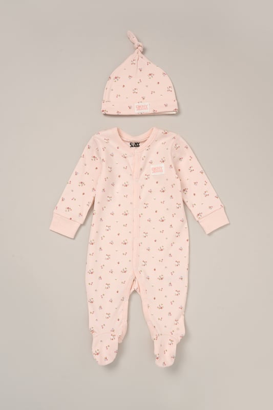 This adorable 2-piece set from DKNY includes a soft cotton all-in-one and a matching hat to keep little ones comfy and covered. Lightweight and breathable, it's perfect for warm spring days or summer naps. An easy all-day outfit for play, cuddles, and everything in between.