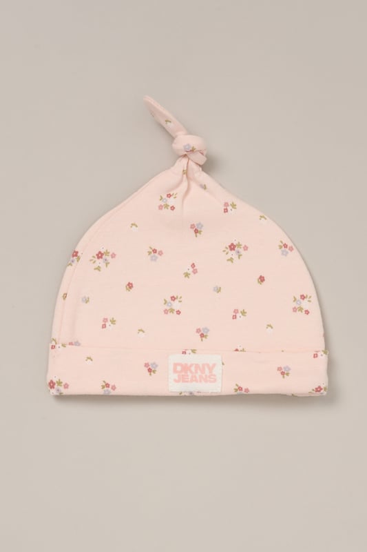 This adorable 2-piece set from DKNY includes a soft cotton all-in-one and a matching hat to keep little ones comfy and covered. Lightweight and breathable, it's perfect for warm spring days or summer naps. An easy all-day outfit for play, cuddles, and everything in between.
