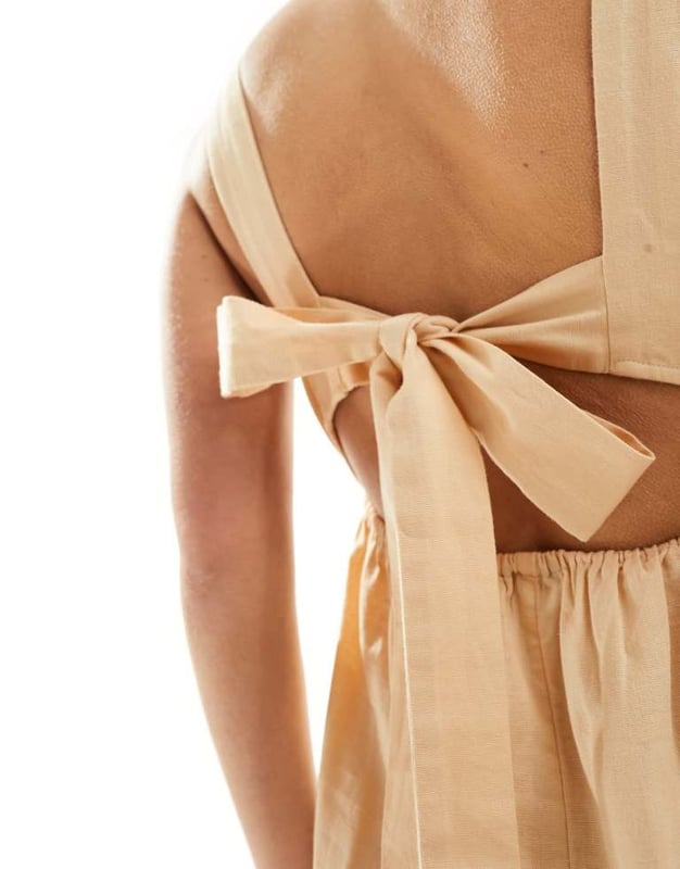 Jumpsuits & Playsuits by ASOS DESIGN No need for a dress to impress Plain design Square neck Fixed straps Tie-back fastening Stretch back panel Regular fitSold By: Asos