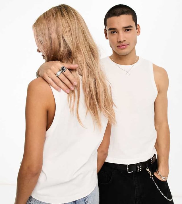 Tops by Calvin Klein Jeans  Round neck Sleeveless style Logo tab to side Regular fit Unisex styleSold By: Asos