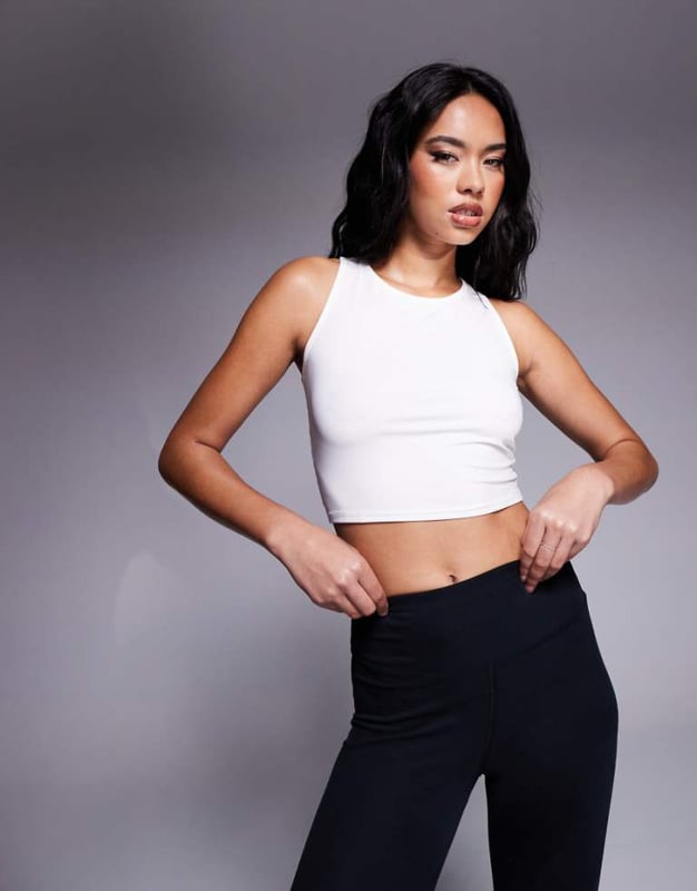 Tops by ASOS 4505 *Saves to inspo folder* Crew neck Logo print to reverse Cropped length Regular fitSold By: Asos
