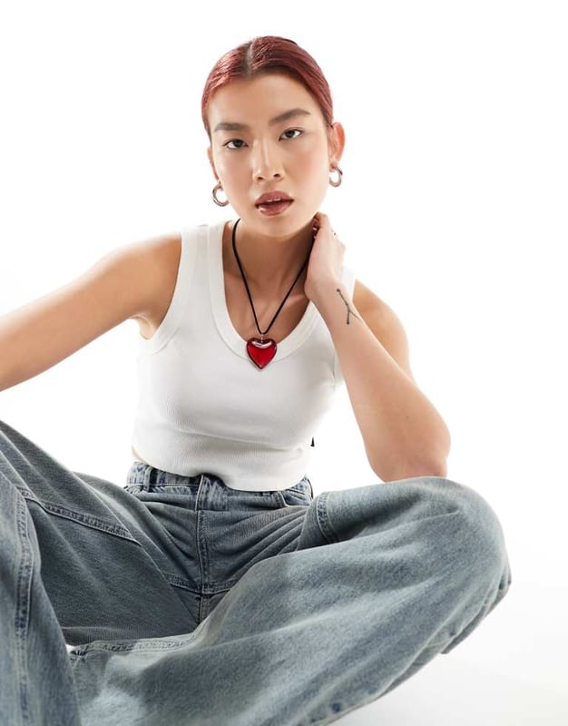 Tops by Vans Next stop: checkout Plain design Scoop neck Cropped length Racer back Slim fitSold By: Asos