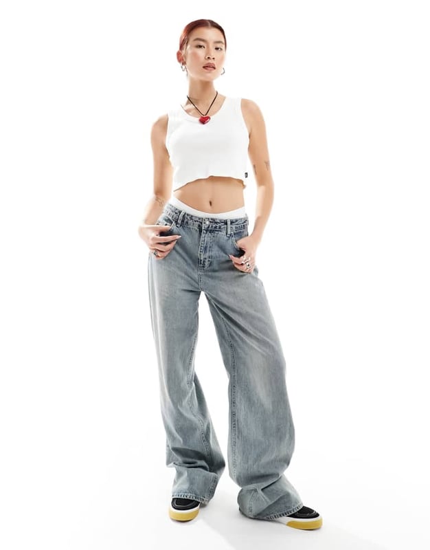 Tops by Vans Next stop: checkout Plain design Scoop neck Cropped length Racer back Slim fitSold By: Asos
