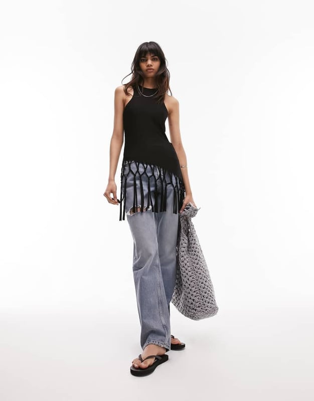 Tops by Topshop Welcome to the next phase of Topshop Round neck Racer back Regular fitSold By: Asos