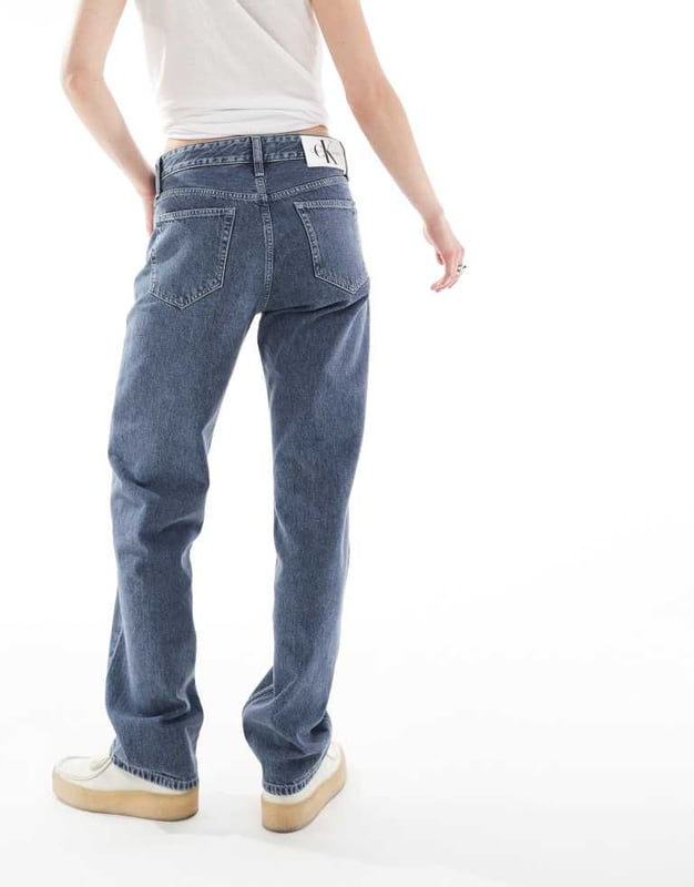Calvin Klein Jeans 90s straight jeans in grey wash - ASOS Exclusive Jeans by Calvin Klein Jeans Straight fit Belt loops Five pockets Branded patch to reverse Unisex styleSold By: Asos