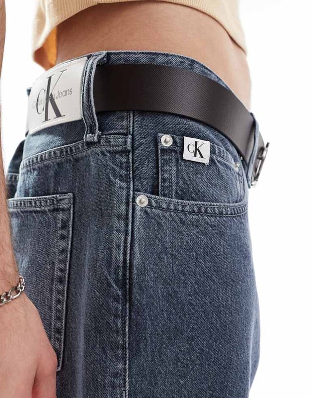 Calvin Klein Jeans 90s straight jeans in grey wash - ASOS Exclusive Jeans by Calvin Klein Jeans Straight fit Belt loops Five pockets Branded patch to reverse Unisex styleSold By: Asos