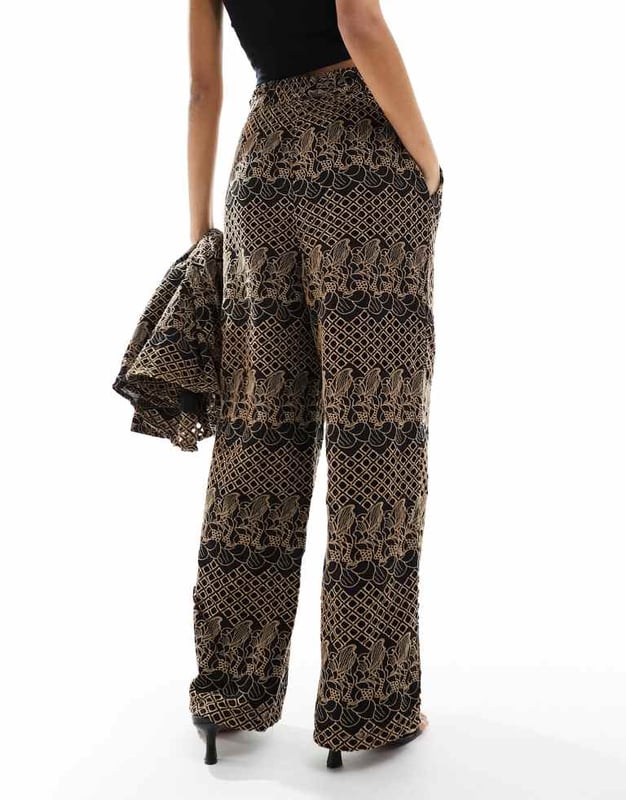 Trousers & Leggings by Y.A.S Part of a co-ord set Shirt sold separately Low rise Elasticated waistband Side pockets Wide legSold By: Asos
