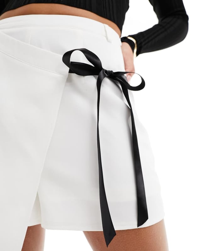 Skirts by Kaiia *insert heart-eyes emoji here?* Skort style High rise Wrap front Bow detail Regular fitSold By: Asos