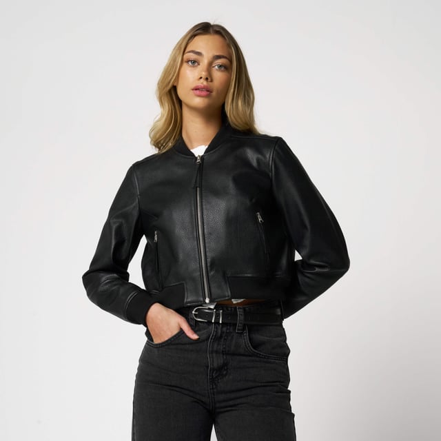 Barneys Originals Real Leather Cropped Bomber Jacket

A modern twist on a timeless classic. This cropped bomber jacket from Barneys Originals is crafted from textured real leather for a rich, tactile finish that only gets better with wear. Designed with a flattering cropped fit, it’s finished with soft knit rib cuffs and hem for that authentic bomber feel.

Whether thrown over a dress or paired with denim, this jacket adds edge and attitude to any outfit.

Key Features:

100% real textured leather

Flattering cropped fit

Ribbed knit cuffs and hem for comfort

Zip-through fastening for easy layering

The ultimate cool-girl staple, made to wear on repeat.