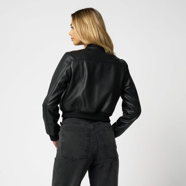 Barneys Originals Real Leather Cropped Bomber Jacket

A modern twist on a timeless classic. This cropped bomber jacket from Barneys Originals is crafted from textured real leather for a rich, tactile finish that only gets better with wear. Designed with a flattering cropped fit, it’s finished with soft knit rib cuffs and hem for that authentic bomber feel.

Whether thrown over a dress or paired with denim, this jacket adds edge and attitude to any outfit.

Key Features:

100% real textured leather

Flattering cropped fit

Ribbed knit cuffs and hem for comfort

Zip-through fastening for easy layering

The ultimate cool-girl staple, made to wear on repeat.