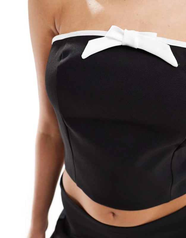 Tops by Kaiia Part of a co-ord set Skirt sold separately Bandeau style Bow detail Zip-back fastening Regular fitSold By: Asos
