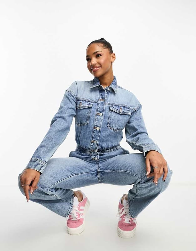 Jumpsuits & Playsuits by Miss Selfridge Your no effort, effort-maker Spread collar Partial button placket Long sleeves Functional pockets Straight leg Regular fitSold By: Asos