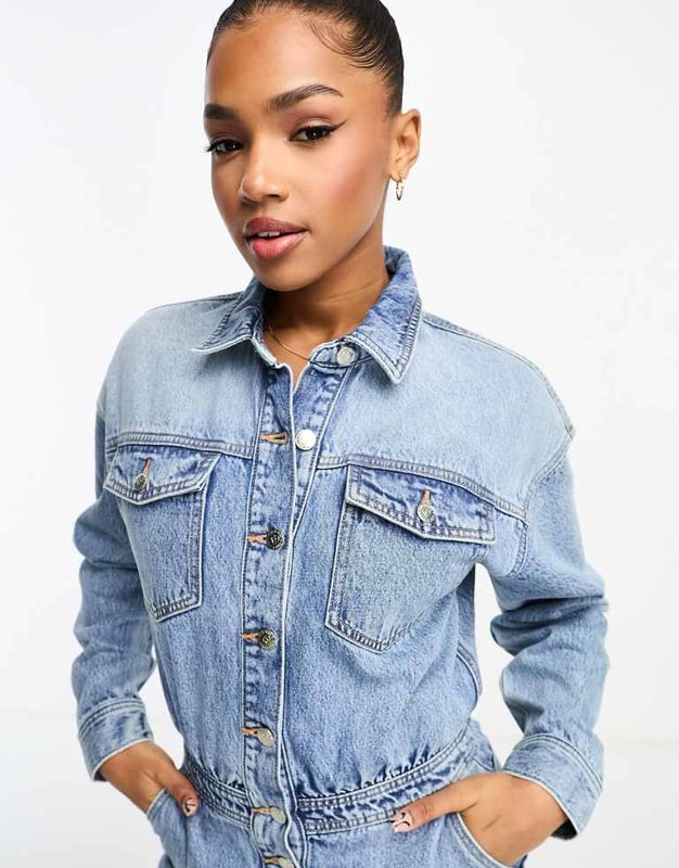 Jumpsuits & Playsuits by Miss Selfridge Your no effort, effort-maker Spread collar Partial button placket Long sleeves Functional pockets Straight leg Regular fitSold By: Asos