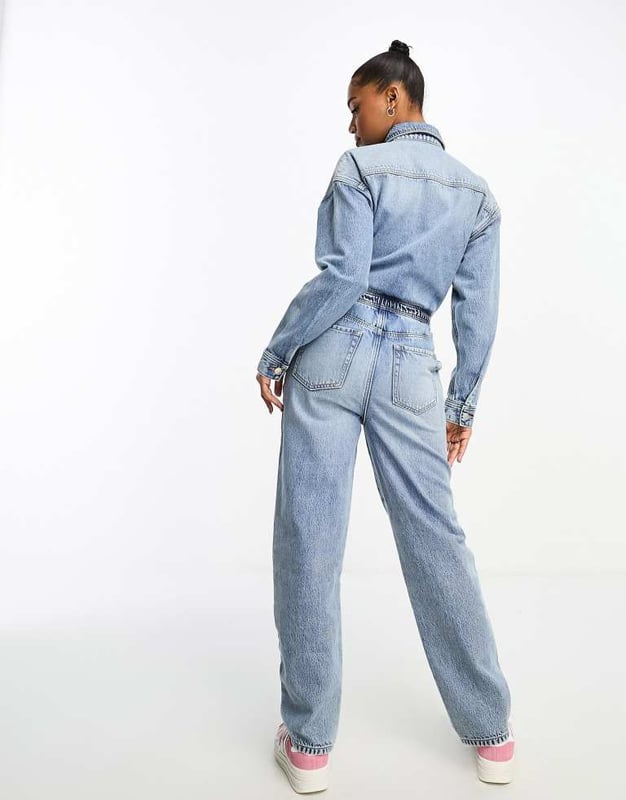 Jumpsuits & Playsuits by Miss Selfridge Your no effort, effort-maker Spread collar Partial button placket Long sleeves Functional pockets Straight leg Regular fitSold By: Asos